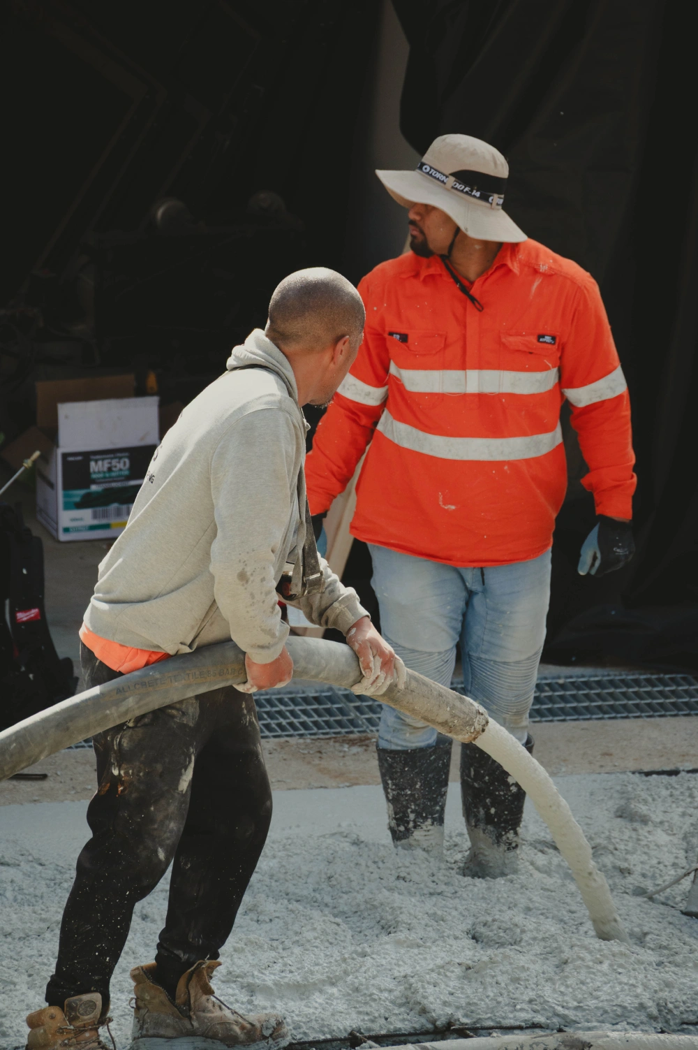 TT Constructions crew pouring concrete on site
