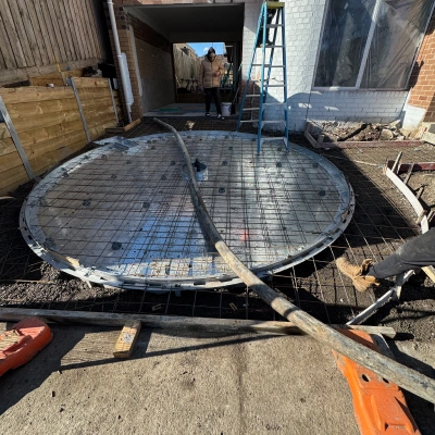 Circular reinforcement mesh ready for a concrete pour