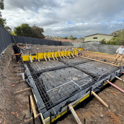 Reinforcement and formwork for a commercial footing